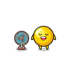 Cute Egg Yolk Is Standing In Front Of The Fan