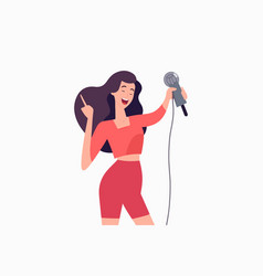 Happy Woman Pointing At A Microphone In Her Hands