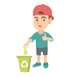 Little Boy Throwing Banana Peel In Recycling Bin