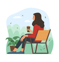 Woman Sitting On Chair And Relaxing In Garden