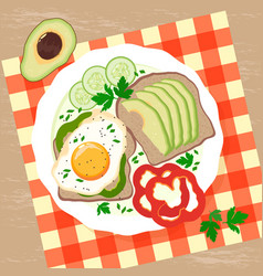 Appetizing Breakfast With Fried Eggs And Avocado