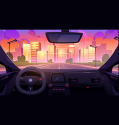 View From Inside Of Car On City During Sunset