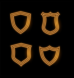 Four Golden Neon Shield Icons