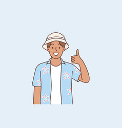 Asian Man In Summer Shirt Showing Thumbs Up