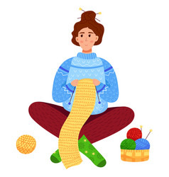 Woman Knitting A Long Colorful Scarf Sitting