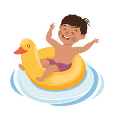 Little Boy Swimming With Yellow Duck Rubber Ring