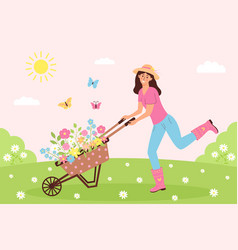 Happy Woman Pushing Garden Cart With Flowers