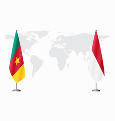 Cameroon And Monaco Flags For Official Meeting