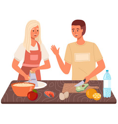 Man And Woman Mixing Ingredients For Meatless Dish