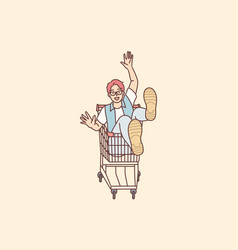 Cheerful Man Rides Sitting In Cart And Supermarket