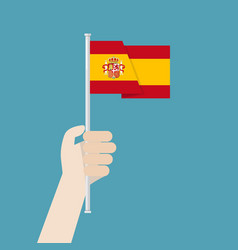 Hand Holding Up Spain Flag