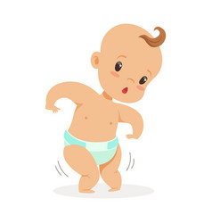 Sweet Funny Baby In A Diaper Trying To Walk