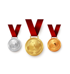 Gold Silver And Bronze Medals Hanging On Red