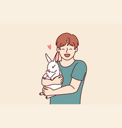 Boy With Little Rabbit Laugh Hugging Beloved Pet