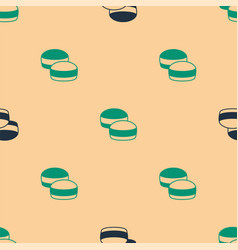 Green And Black Macaron Cookie Icon Isolated