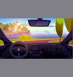 Car Driver View Of Seaside City And Mountains