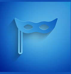 Paper Cut Festive Mask Icon Isolated On Blue