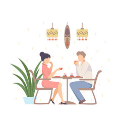 Woman And A Man Are Drinking Coffee In A Cafe