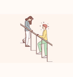 Woman With Head Down Goes Down Stairs And Man