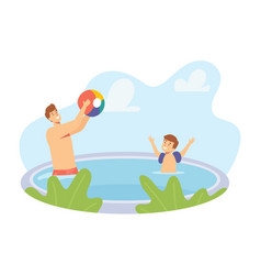 Father And Little Son Playing In Swimming Pool