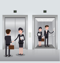 Business People In Office Building Elevator