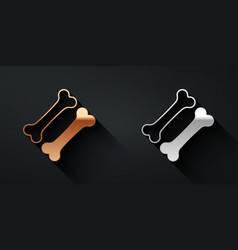 Gold And Silver Dog Bone Icon Isolated On Black