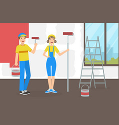 Woman And Man Painters With Rollers Painting Wall