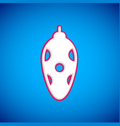 White Christmas Toy Icon Isolated On Blue