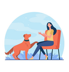 Happy Woman Training Dog And Sitting On Chair