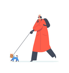 Young Woman Walking With Playful Dog At Cold