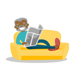 Man Laying On The Couch And Reading A Newspaper