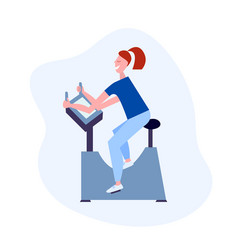 Woman On Exercise Bike