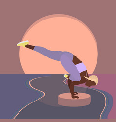 Young Woman Doing Yoga Flying Pigeon Pose