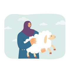 Woman In Hijab Holding Sheep In Hands