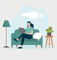 Woman Sit On Sofa With Laptop