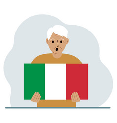 A Man Holds An Italian Flag In His Hands