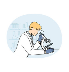 Male Scientist Examine Sample In Microscope