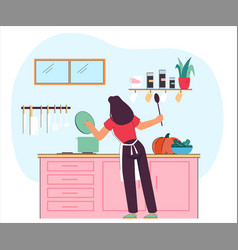 Woman Standing Near Stove In Kitchen Holding Spoon