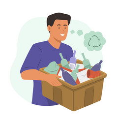 Man Holding A Box Of Garbage For Recycle Concept