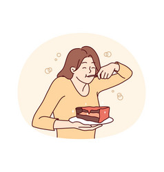 Young Woman Eating Chocolate Cake