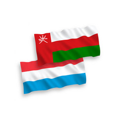 Flags Of Sultanate Of Oman And Luxembourg On A