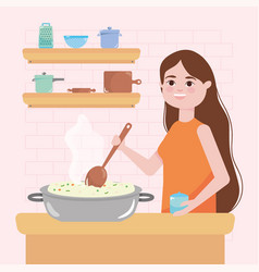 Kitchen Design With Woman Cooking Stirring A Rice