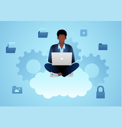 Black Man Working With Laptop On Clouds