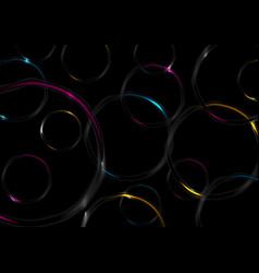 Colorful Glossy Glowing Rings On Black Background