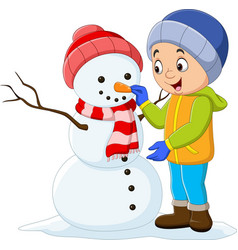 Cartoon Little Boy Building A Snowman