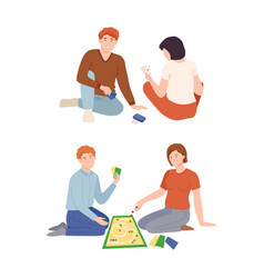 Couples Sitting On Floor Playing Tabletop Or Board