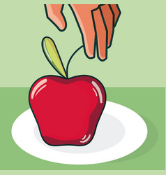 Hand Grabbing Apple