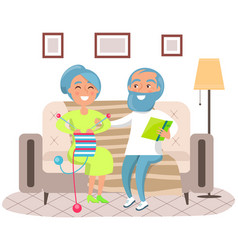 Married Couple Sitting On Sofa At Home Elderly