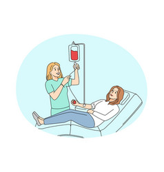 Female Donor Donate Blood In Clinic