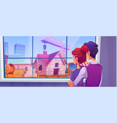 Couple Looking At House Construction Site